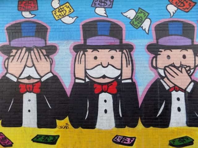 Monopoly man graffiti on wall