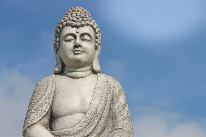 Buddha statue with blue sky