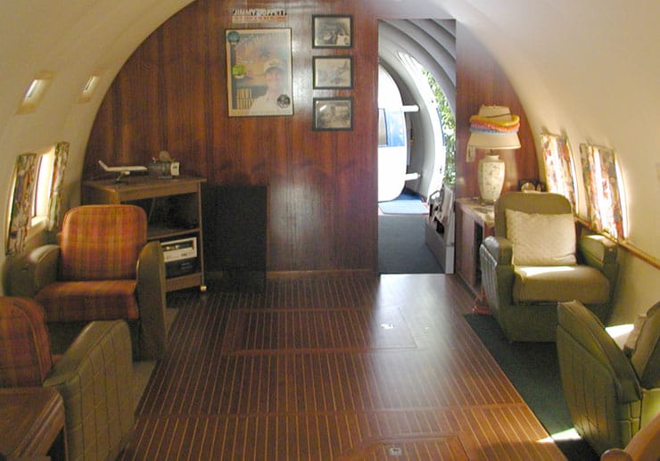 The interior of the plane boat, with several nice chairs, similar to a luxury plane cockpit