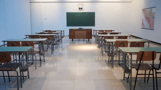 Empty classroom, with desks in rows