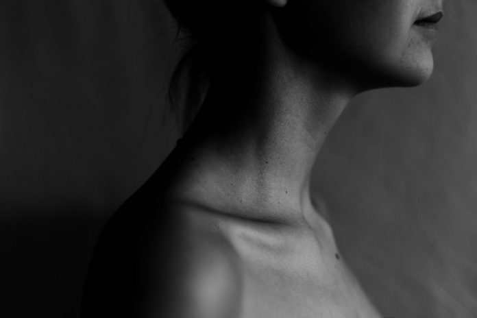Side profile of woman's neck