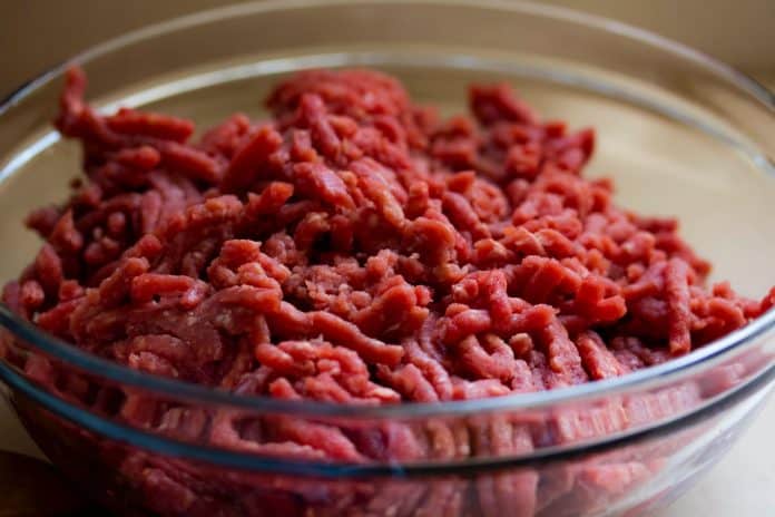 Glass bowl filled with raw ground beef