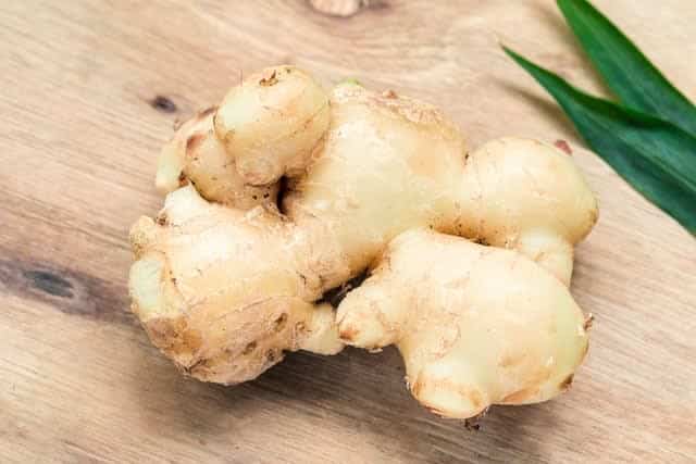 Ginger root on cutting board