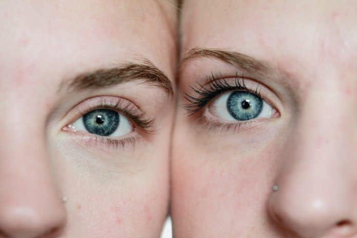 Close up of two women's blue eyes.