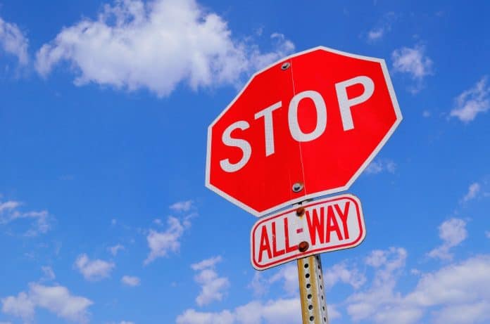 Stop sign with blue sky
