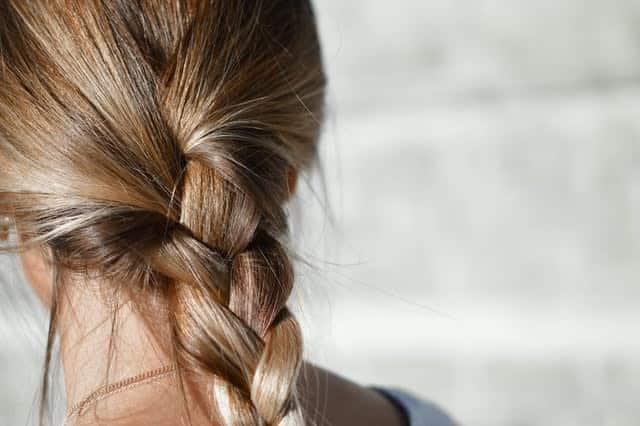 Close up of blonde ponytail braid