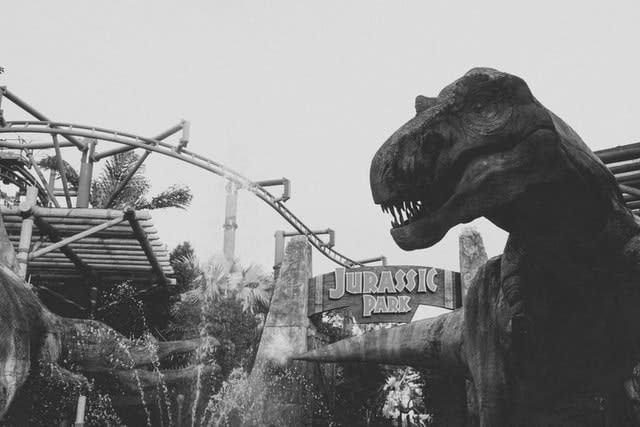 Jurassic Park movie set with dinosaurs and gate